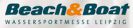 beach and boat logo